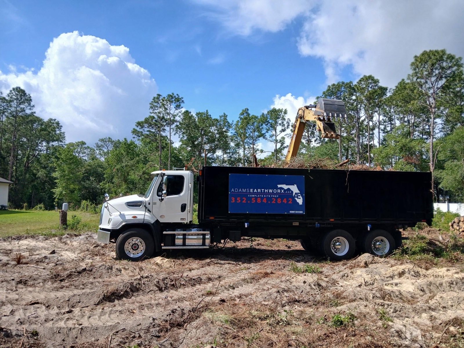 Overgrown Florida acreage being knocked back down by Adams Earthworx