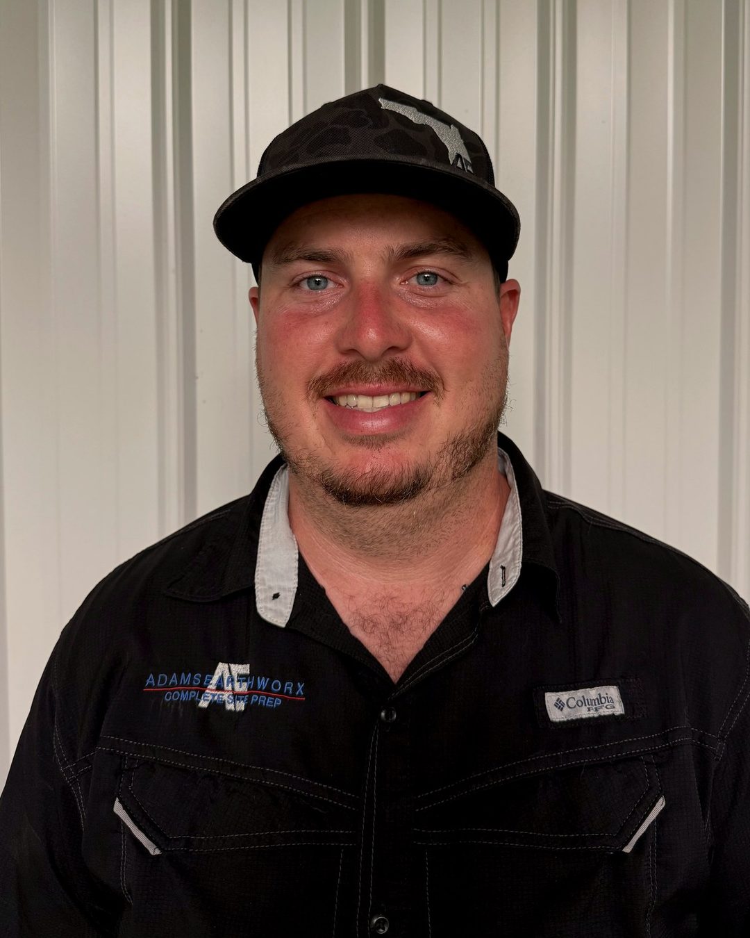 Sam Adams, owner and operator of Adams Earthworx